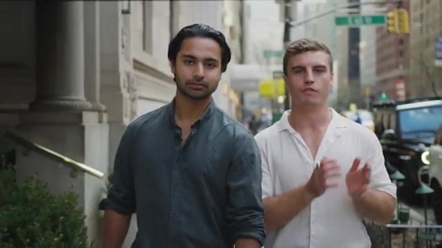 Sachin and Adam walking toward Fortell's Upper East Side clinic on East 61st Street in New York